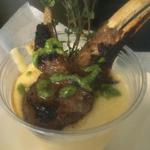 Grilled Lamb Chops with Black Truffle Cheese Grits and a Pesto Drizzle